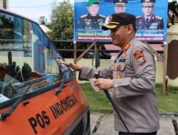 Kapolres Dairi Bagikan Stiker Mensukseskan Event International F1H20 Power Boat Lake Toba